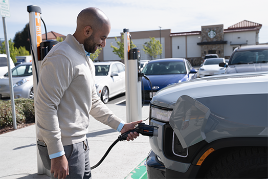 Person charging their car using ChargePoint CT4K