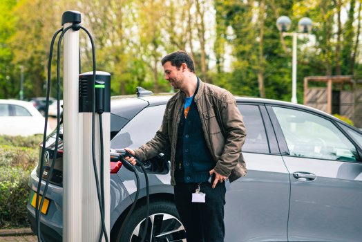 person charging on ChargePoint CP6000